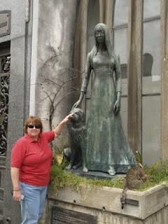 If you rub the nose of her beloved dog it is good luck.... and the cemetery workers do not need to dust it as much.