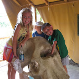 Hannah and Bryan standing on an elephant skull at the Nashville Zoo 09032011