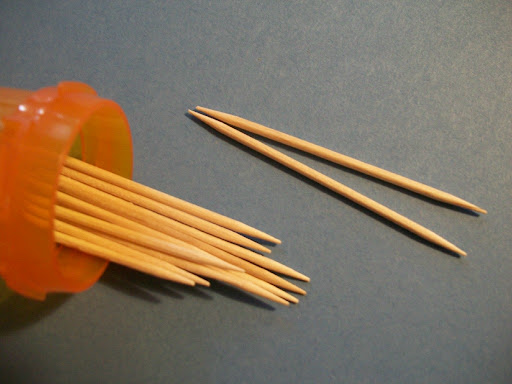 Keep toothpicks together.