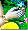 Sita holding Rama's ring