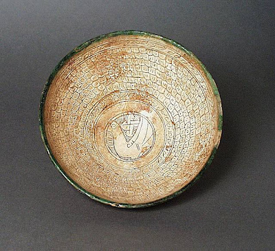 Bowl Iran Bowl, 11th century Ceramic; Vessel, Earthenware, white slip, incised, color under a transparent glaze, 3 1/4 x 7 1/4 in. (8.26 x 18.42 cm) The Nasli M. Heeramaneck Collection, gift of Joan Palevsky (M.73.5.253) Art of the Middle East: Islamic Department.