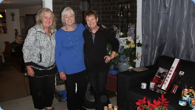 Desiree Barrows, Delysie Whorwood and Diane Lyons celebrating a job well done packing the Xmas Hampers for our December Club Night. They packed the goodies after the Coffee Day finished. Photo courtesy of Dennis Lyons.