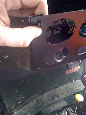 Then the new front plate fits to the two side wings of the original Land Rover centre console.