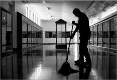 c0 school janitor mopping after everyone is gone.