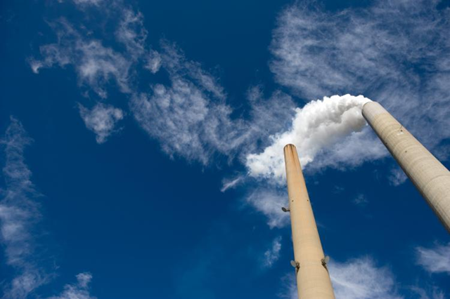 The smoke stacks of a coal power plant in New Haven, West Virginia, on 30 October 2009. Saul Loeb / AFP / Getty Images