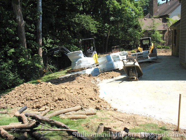 loaders, dirt , stone