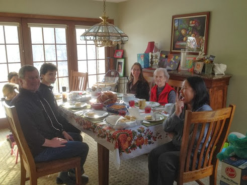 c03 Our Thanksgiving Table (L-R) brother Tom, son Charlie, friend Emma, daughter Dee Dee, Tom's wife Cindy, Cindy's mom Betty, and my beautiful wife Jing  