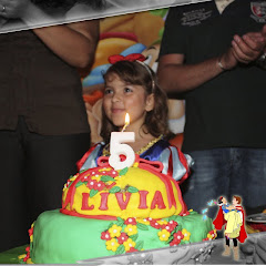 Fotos do evento Lívia Macedo - 5 anos. Foto numero 020. Fotografia (fotografias) de Adriana Pimenta Produções, que faz foto e vídeo de casamentos, aniversários e eventos em geral, bem como fotoprodutos, fotolivros e álbuns diagramados. Atua em São Paulo. fotos de casamento sao paulo sp para fotografia são fotografos casamentos festa infantil crianças aniversario fotoprodutos filmagem fotógrafos e profissional videos 15 anos crianca