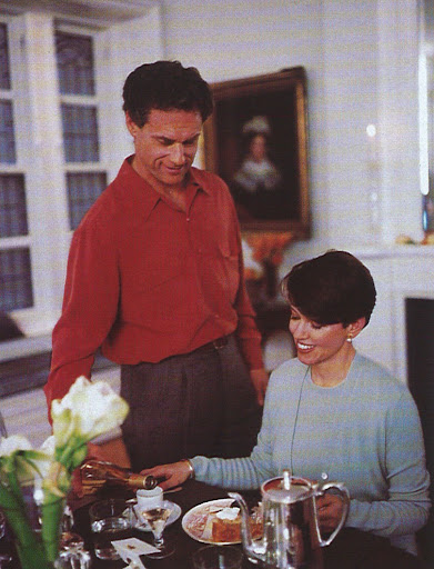 Tim pours dessert wine for Ginny.