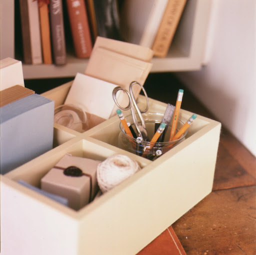 Compartmentalized boxes can hold a variety of supplies.