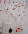 In the middle is the letterpressed invite, and around it you can see Rosma's DIY handiwork.