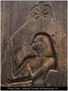 Egyptian goddess Seshat with  hemp leaf in head dress.