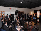 Press and media await the beginning of the press conference for the sale of the first Full HD 3D Home Theater System.  Representatives from Panasonic and Best Buy were present, along with representatives from Fox Video and DirecTV.