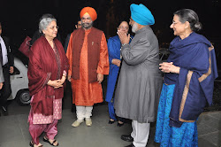 Bhayee Sikandar Singh and Mrs Paramjit Kaur (right) greet Mrs Gursharan Singh