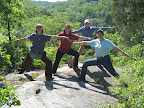 the yoga clinic ladies stop along the trail (at Owl Bluff) to practice some yoga poses.