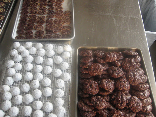 I made flourless double chocolate pecan cookies and hazelnut sandies. Khalil made the palmiers from a box of chocolate puff pastry we had in the freezer.