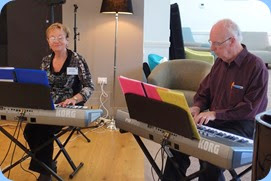 Diane Lyons and Peter Brophy playing their Korg Pa900's as a duet. Photo courtesy of Dennis Lyons.