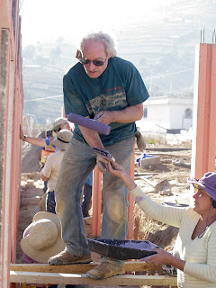 Ira and Laura using teamwork for the final details. Photos by TOM HART