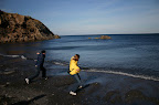 Cecilia and Matt skipping stones