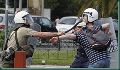 A-riot-policeman-strikes--004 A-riot-policeman-strikes--004