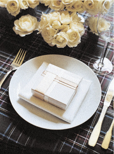 The tabletop decor is gorgeous -- especially the tablecloth.