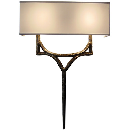 I've been looking for sconces to use in my hallways and bedroom - this hammered bronze sconce is definitely on my radar now.