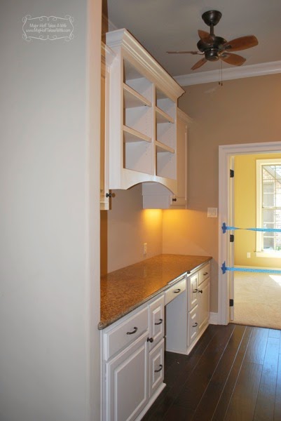 Built in desk between 2 walls with arched bookcase above.jpg Built in desk between 2 walls with arched bookcase above