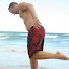 As a German, he is trained from birth in three different categories of beach skill. Trench building falls under 'protection', and also includes crab defense and sun screen application at velocity.