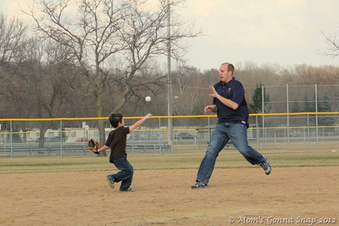 Throwing the ball!!  (He forgot he is supposed to tag him...)  Mitch's face is the best!