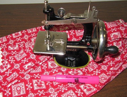 little singer and apron I took pic