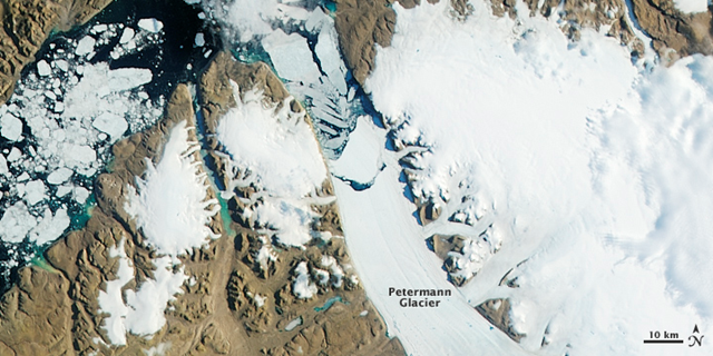 A massive iceberg, or ice island, broke off of the Petermann Glacier in 2010. Nearly two years later, another chunk of ice has broken free. The Moderate Resolution Imaging Spectroradiometer (MODIS) on NASA’s Aqua satellite observed the new iceberg calving and drifting downstream on 16–17 July 2012. NASA Earth Observatory image by Jesse Allen, using data from the Land Atmosphere Near real-time Capability for EOS (LANCE)