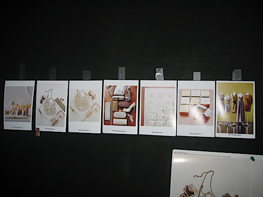 Some of our polaroids. We tape them up as we go to help us visualize the entire story.