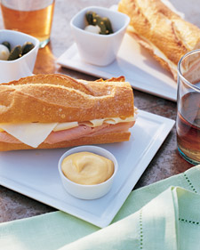 Ham and Swiss is a more classic sandwich. Make it special on a baguette Ham and Swiss is a more classic sandwich. Make it special on a baguette