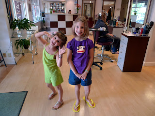 We can see their faces through the hair!  Lily's Betty Paige is adorable.