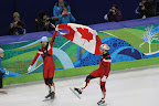 Charles Hamelin and Olivier Jean celebrating their gold and bronze medal-winning races