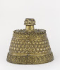 Brass candlestick, repousse, chased and inlaid with copper and silver