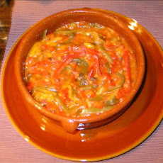Tri-Color Peppers in Garlic, Onions and Tomatoes