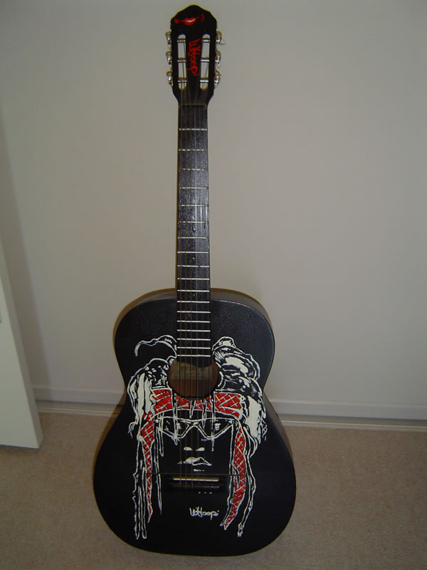 whoopi%20guitar%20email%20size.jpg