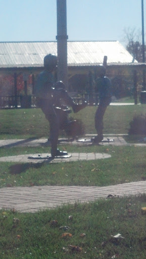 Kids Playing Baseball Statue