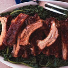Cranberry-Glazed Ribs with Wilted Greens