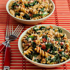 Vegetarian Whole Wheat Pasta Recipe with Fried Kale, Tomato Sauce, and Goat Cheese