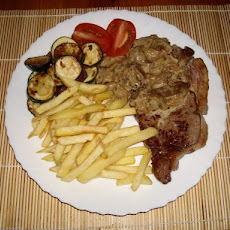 Rib-Eye Steaks W/ Mushrooms, Brandy and Blue Cheese