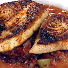 Fresh Swordfish with an Olive Tomato Sauce and Crispy Calamari