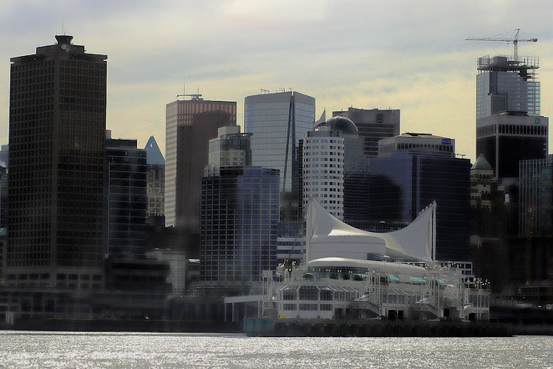 IMAGE: http://lh3.ggpht.com/4walls/SALpd2nV7jI/AAAAAAAACbk/pa0RLw7UgSE/s800/CanadaPlaceHDR.jpg