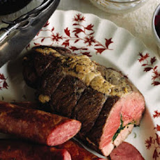Herb-Stuffed Leg of Lamb