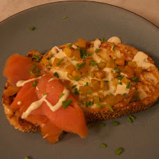 Egg in the basket french toast with smoked salmon, roasted beets, and mustard creme fraiche