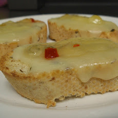 Crostini With Cheese Torta and Marinated Bell Peppers