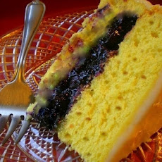 Monet's Mango Surprise: Lemon Pecan Spice Cake filled with Blueberries and Mango