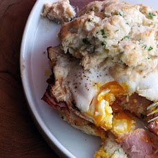 Chive Biscuit Sandwich with Cheddar Spread, Canadian Bacon, and a Fried Egg
