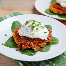 Quinoa Cakes with Roasted Red Pepper and Walnut Pesto, Goat Cheese and a Poached Egg